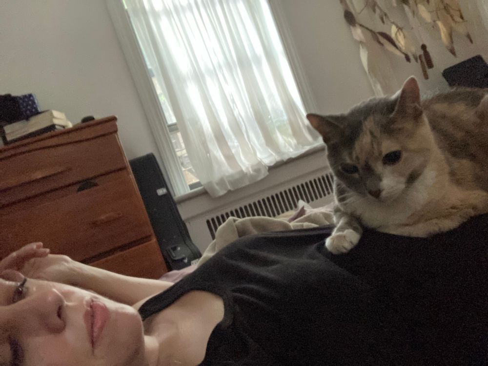 my friend fee, hanging out on my tummy one sunny sunday a few years ago. 