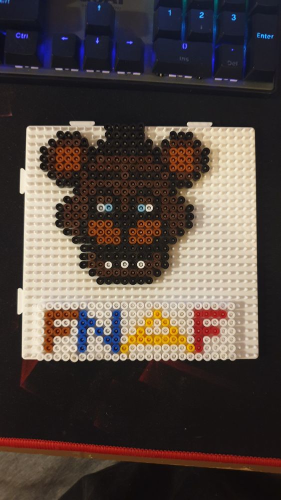 Hama bead artwork of Freddy Fazbear from Five nights at Freddy's.
Also the FNAF text on all the main animatronic colors! F = Brown, N= Blue, A = Yellow and F= Red. Colors of the characters, Freddy, Bonnie, Chica and Foxy. In that order.