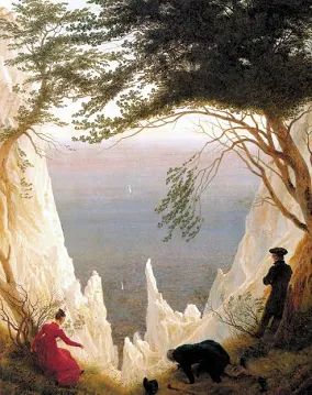 Kreidefelsen auf Rügen. Drei Personen bewegen sich auf dem Bild, links eine Frau und in der Mitte und rechts ein Mann.