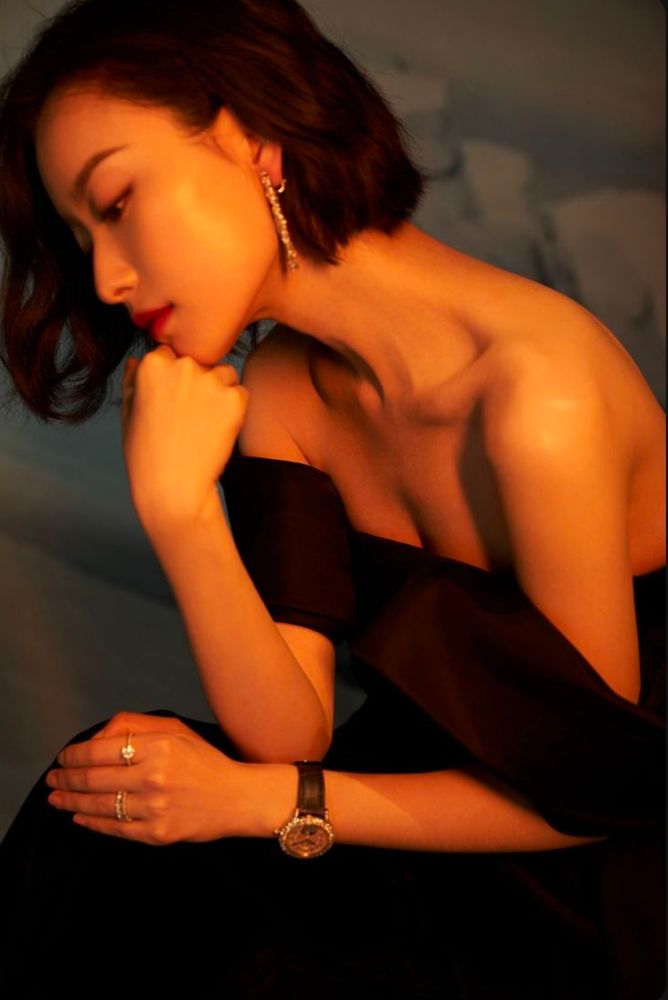 Asian woman posing for photo. Reference.