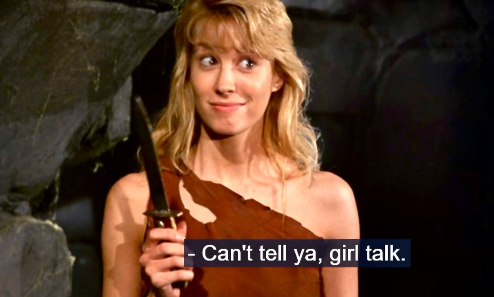 Monique Gabrielle’s character Evie holding up a knife and saying, can’t tell ya, girl talk.