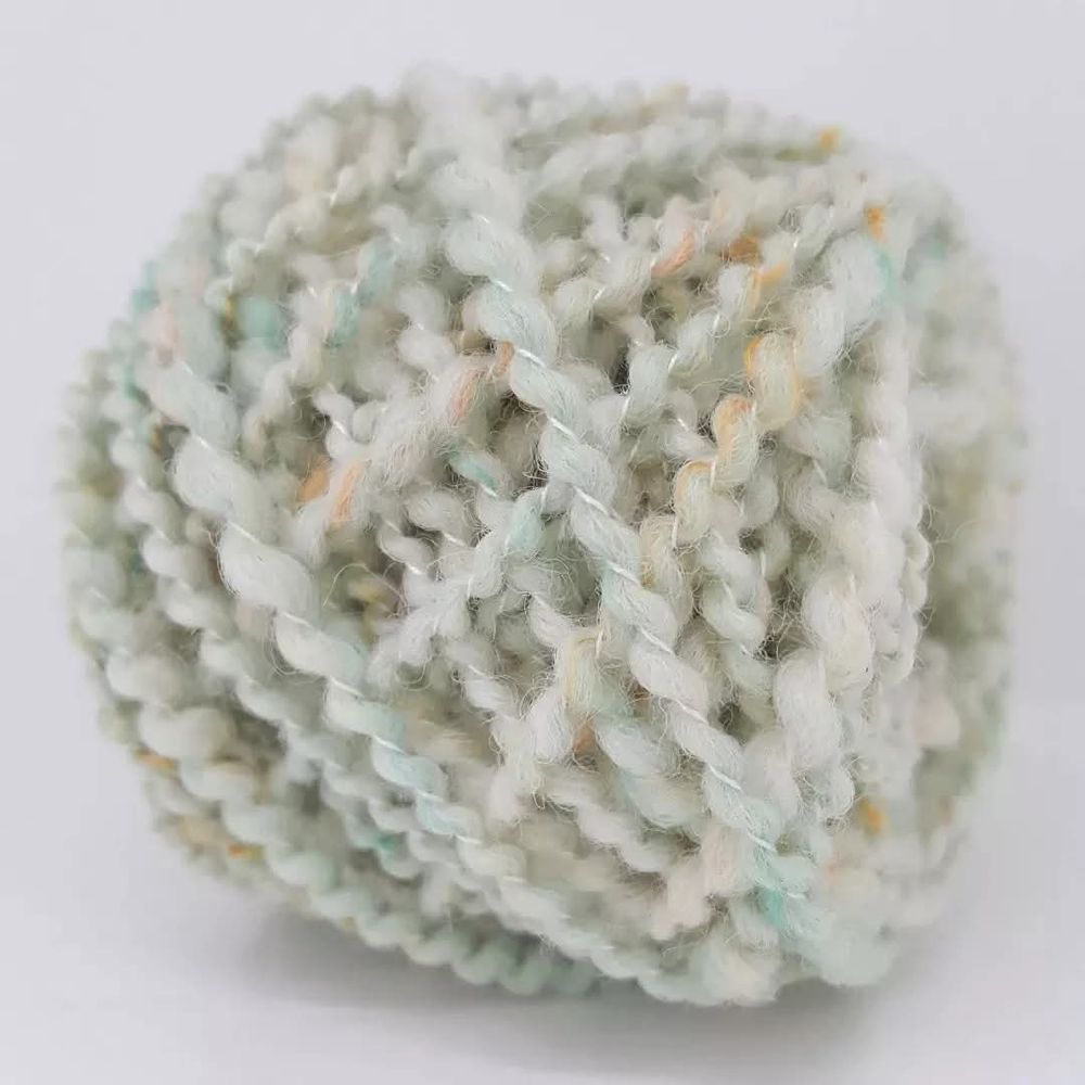 A handspun single plied with silk thread.