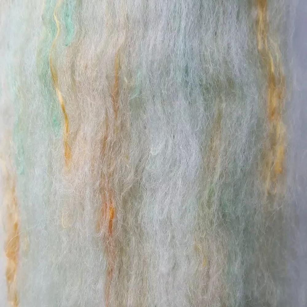 The finished carded batt of Shetlsnd fibre and mulberry silk.