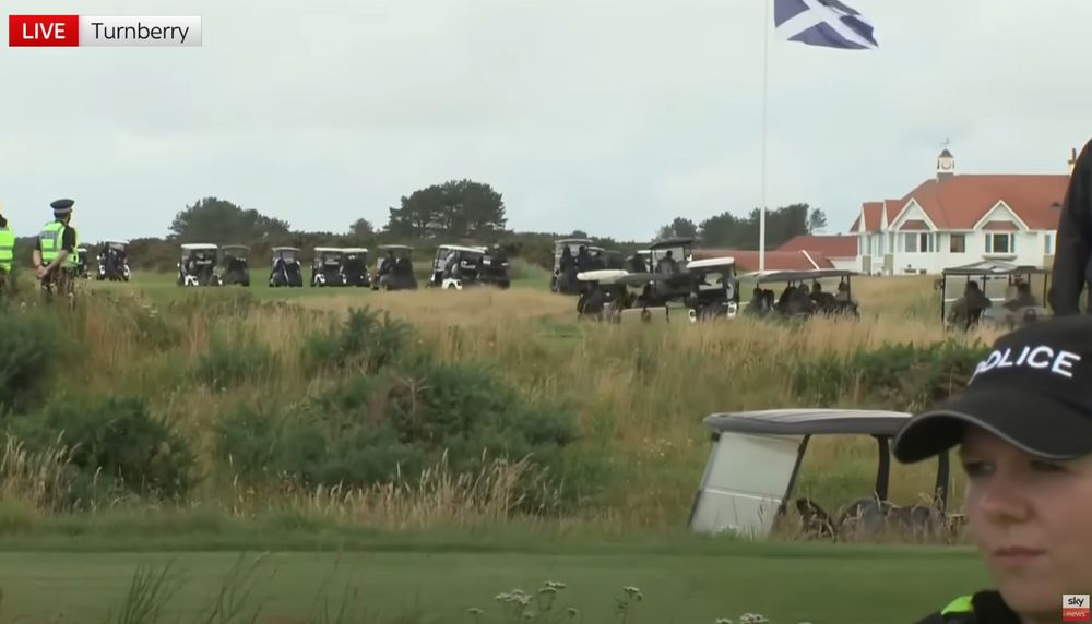 Bronzolini's idiotic cartorcade of his golf group, ball dropping caddies & excessive security detail.