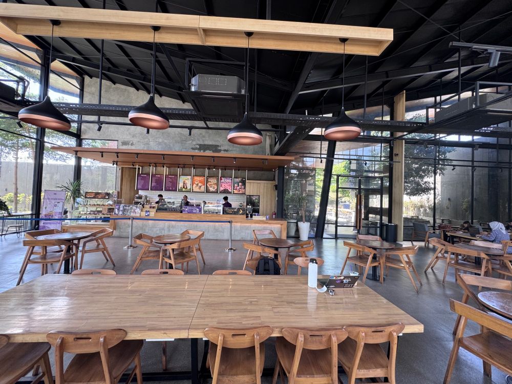 cafe with in front is barista to prepare the drink