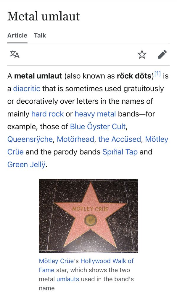 The Wikipedia entry that explains rock dots; 
A metal umlaut (also known as röck döts) is a diacritic that is sometimes used gratuitously or decoratively over letters in the names of mainly hard rock or heavy metal bands—for example, those of Blue Öyster Cult, Queensrÿche, Motörhead, the Accüsed, Mötley Crüe and the parody bands Spın̈al Tap and Green Jellÿ.
