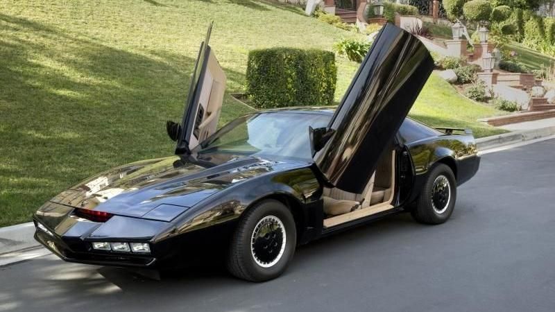 Image of the black trans Am from Knight Rider, giving a Roman salute 