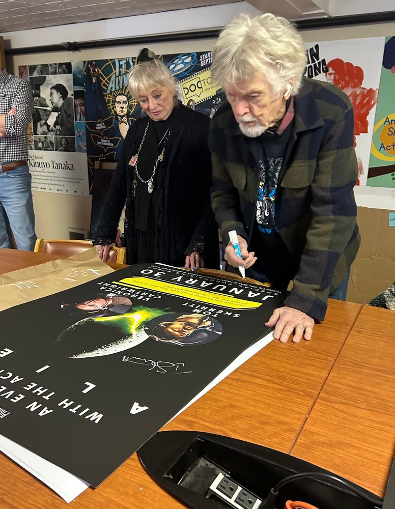 Tom Skerritt and Veronica Cartwright sign an Alien poster  