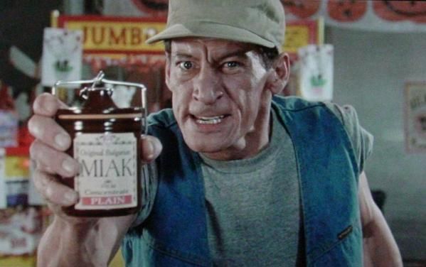 Ernest P Worrell holding a jar of Bulgarian Miak with a determined look on his face.