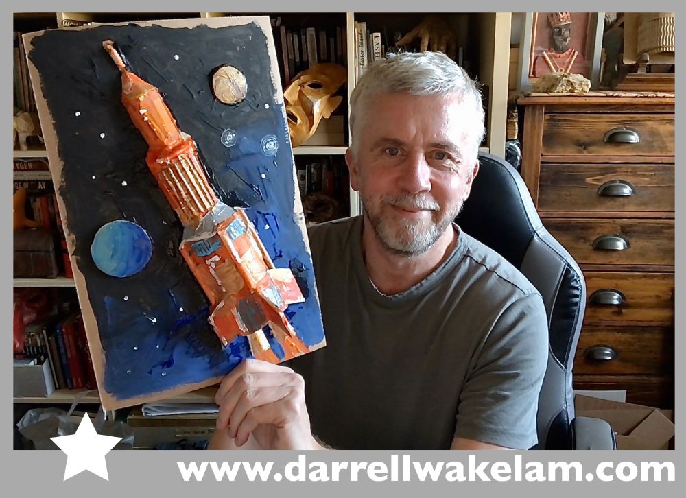 A photo of me holding a model rocket which I made during today's 'zoom' workshop to the Year 5/6 children from Elton Primary School in Bury. 