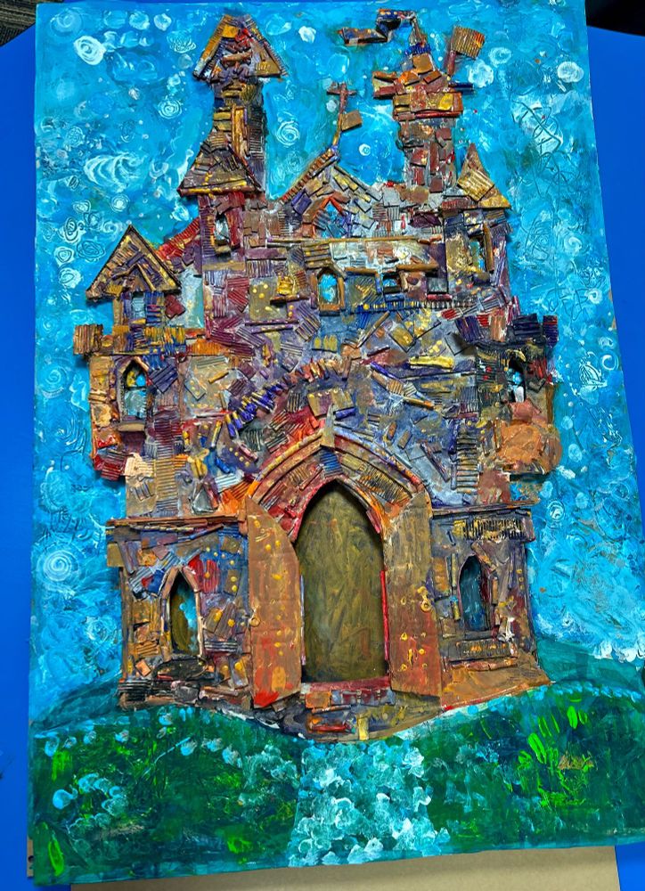 A 3D relief sculpture of a castle, created by all four Reception classes from Hodge Hill Primary. It started out quite simple, but the children have filled it with texture, character, and more importantly colour. Someone very special obviously lives there. 