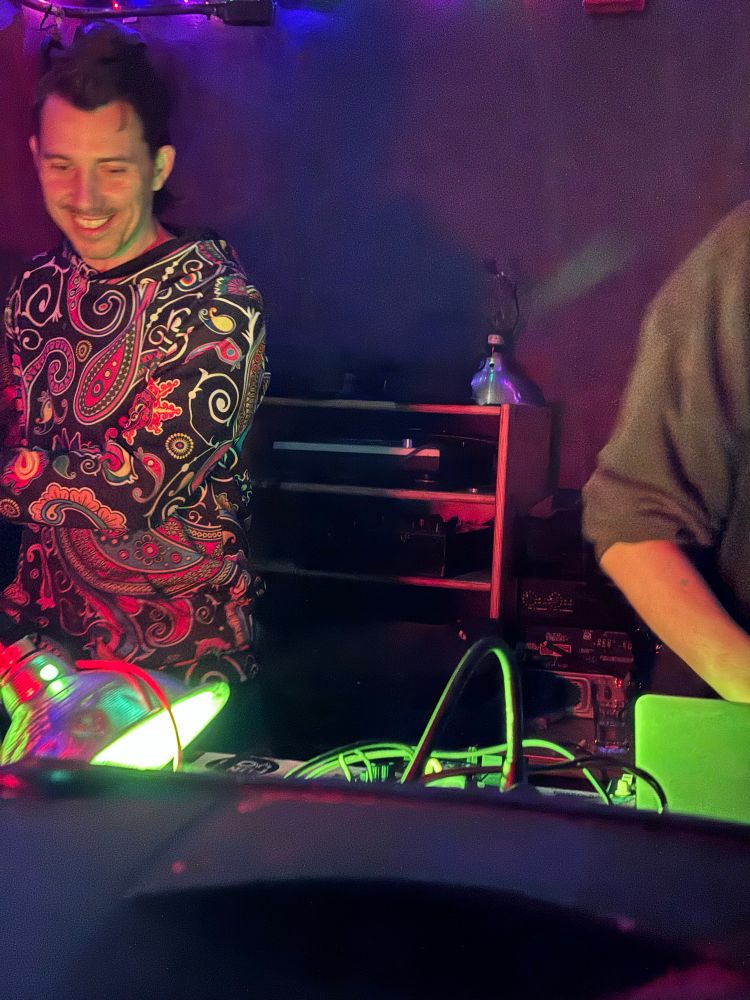 Heartworm trying to snatch a kazoo out of dj 0.000001's hand 