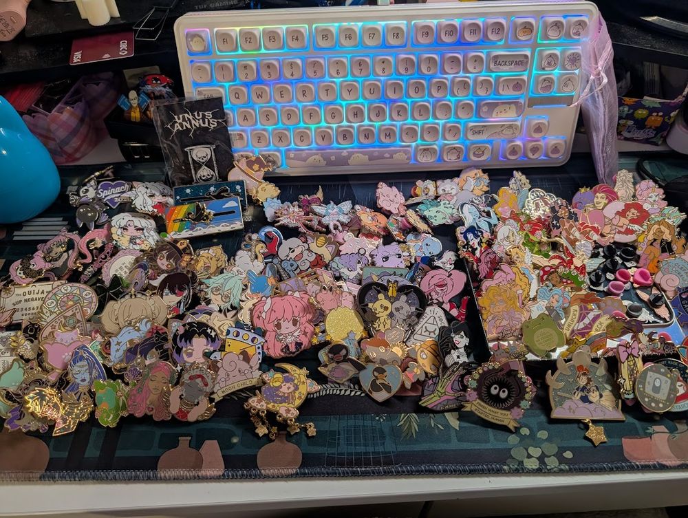 all the pins i had to sort into my display book, over 100 plus. feel free to ask for details on specific pins~