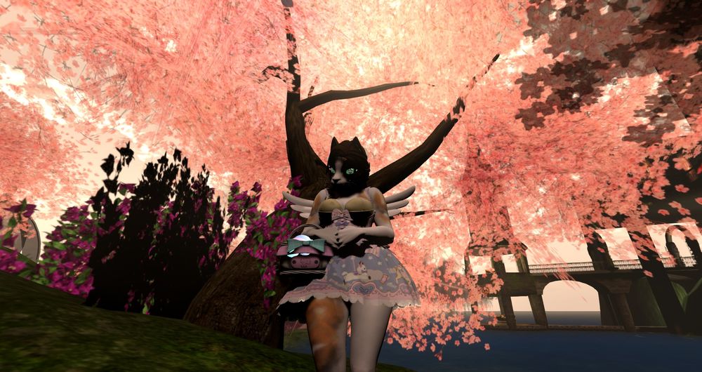 A female anthropomorphic calico cat stands in front of a Sakura Tree. She is in a pastel dress with merry-go-round animals sewn into it. In her arm is an easter egg basket.