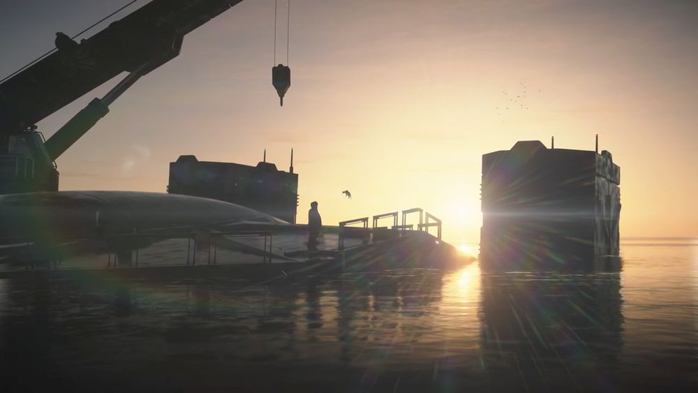 Tarman stands still on the DHV Magellan, while the tar cat approaches him.
The scene is illuminated by the sunset in the background.