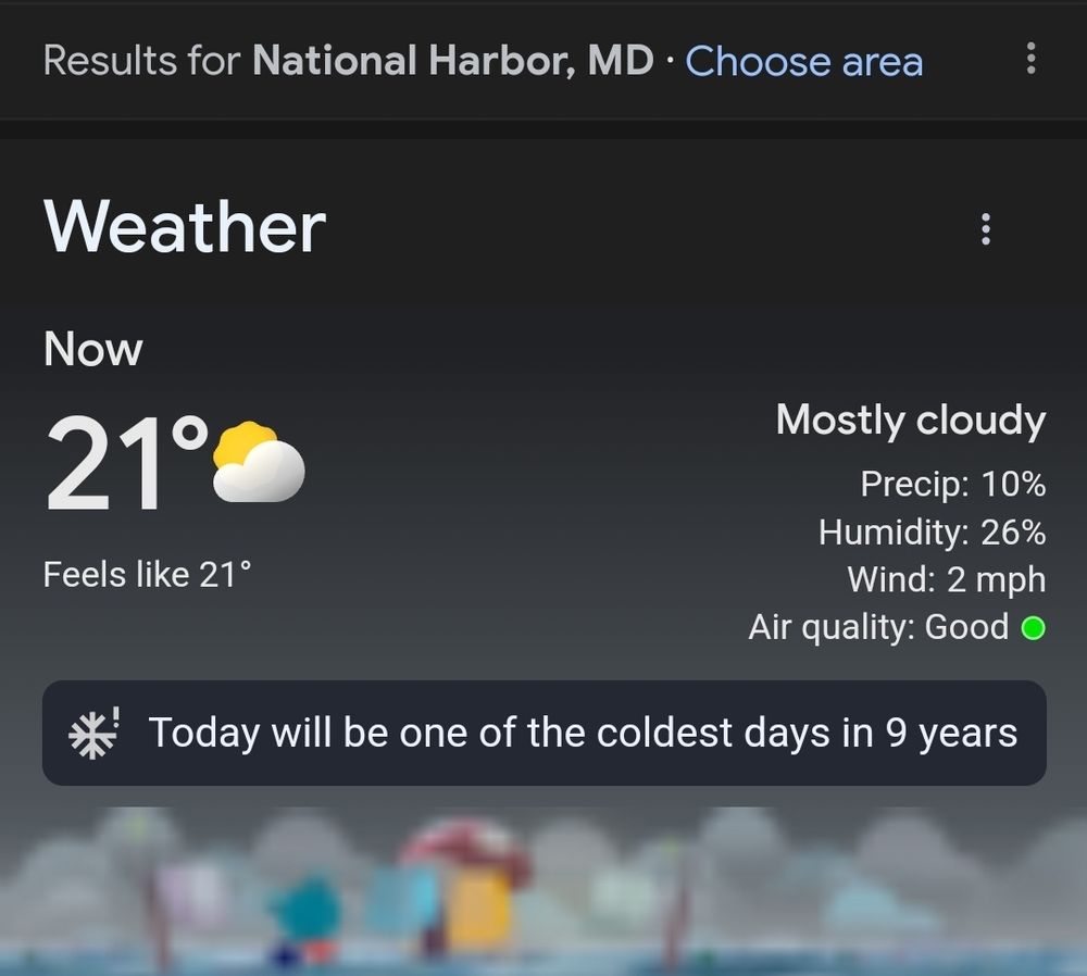 A screenshot of the weather app reading 21°F for National Harbor, Maryland, with a pop up that says "Today will be one of the coldest days in 9 years."