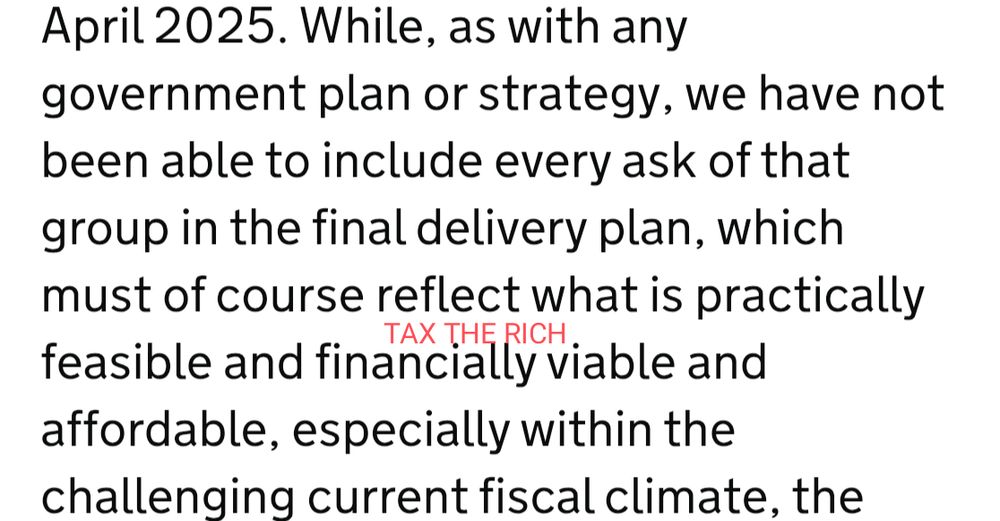 Excerpt from a government document with the sentence: “must of course reflect what is practically feasible and financially viable and affordable,” interrupted by red graffiti-style text reading “TAX THE RICH” inserted between the words. The added phrase subverts the formal tone with a bold political message about wealth redistribution.

