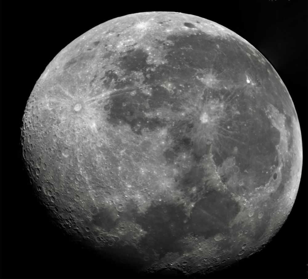 Almost full moon two days after being full including medium lit highlights, and crisp crater images on left edge, 