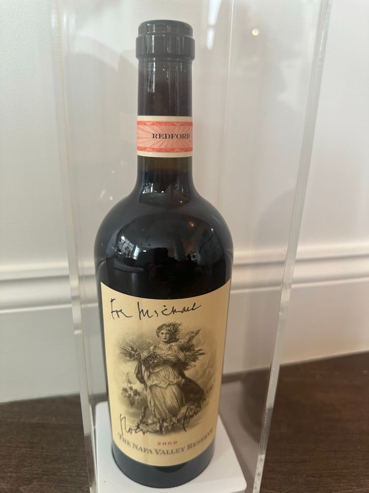 wine from Robert Redford’s Napa vineyard, with a personalized note on the bottle