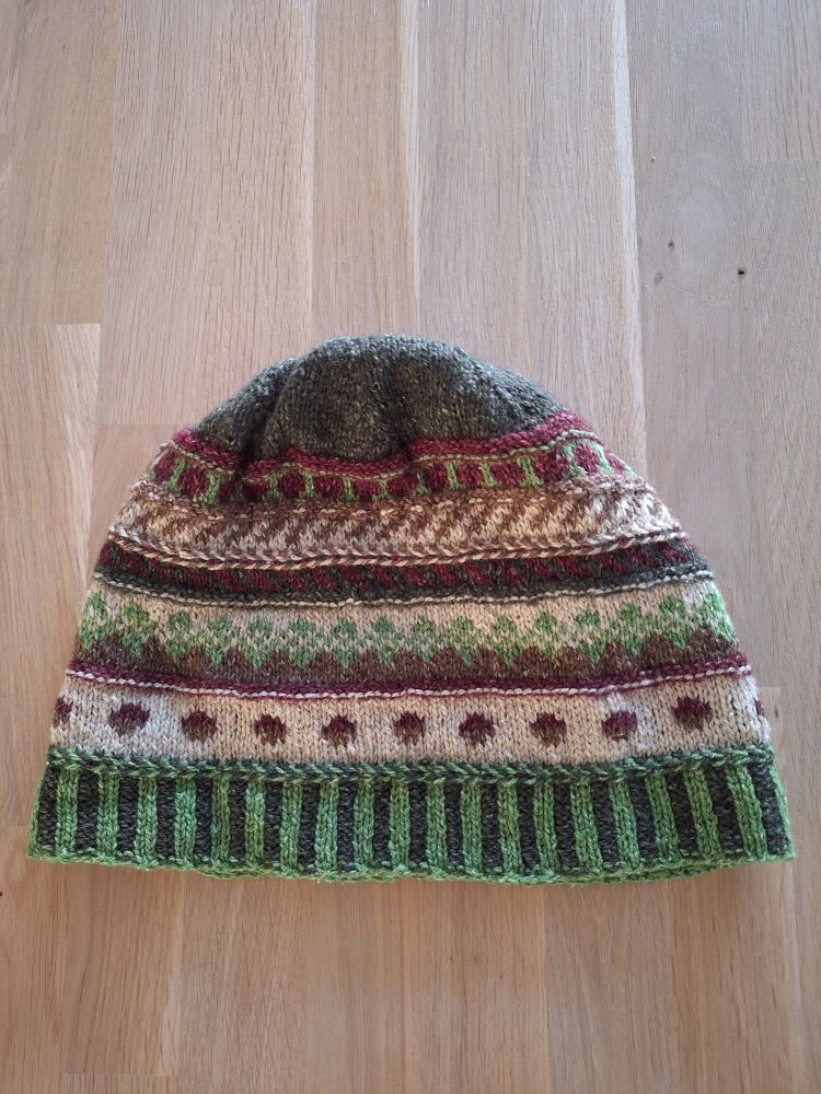 A multicolor hat made of leftover yarn