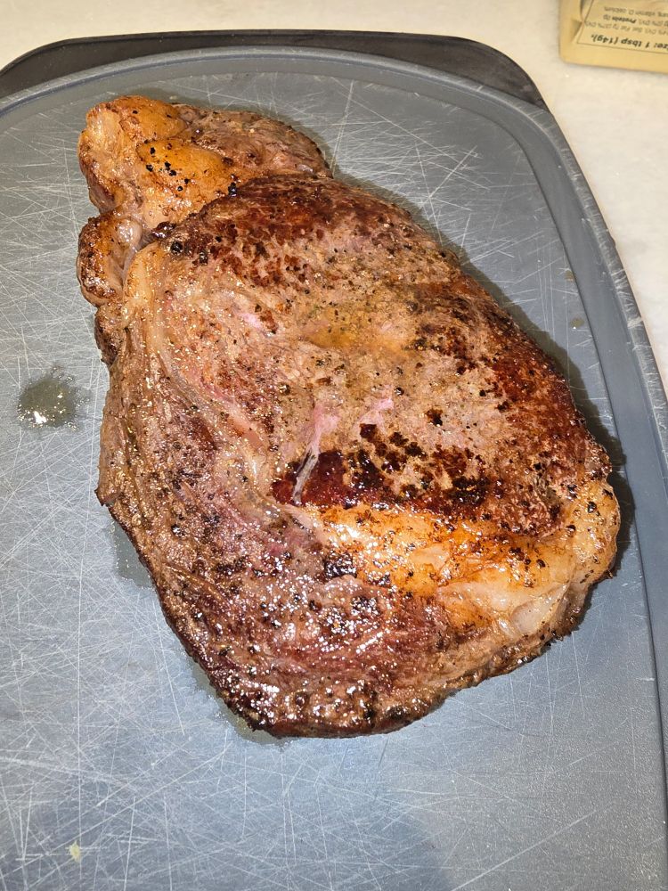 A delicious steak cooked by a baller chef, look at that sear, mmmmhmm YUM