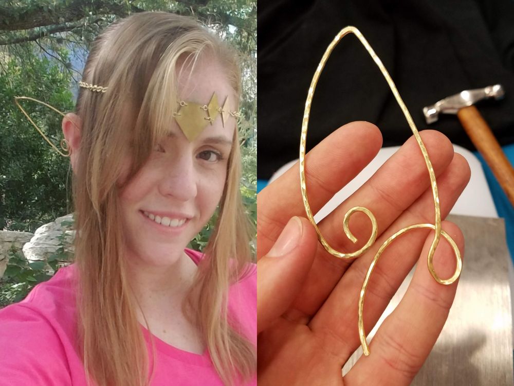 A pair of photos showing some jewelry I made. On the right is the item in my hand - it's a wire ear wrap in the shape of an elf ear (there's a pair but only one is pictured). On the left I am wearing them along with a Zelda-inspired headpiece. All the jewelry is made of brass