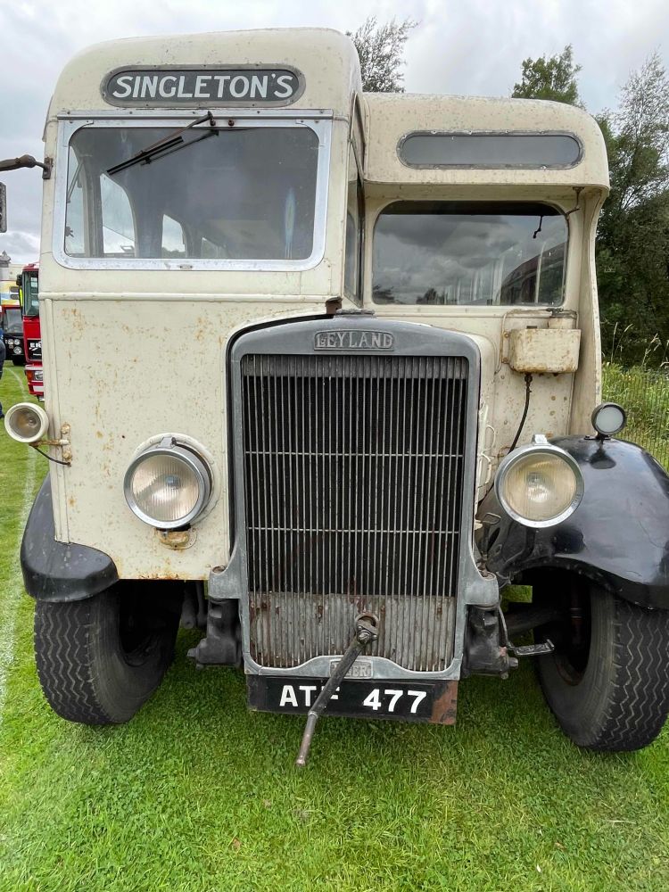 An old bus with the word Singleton's on the destination board