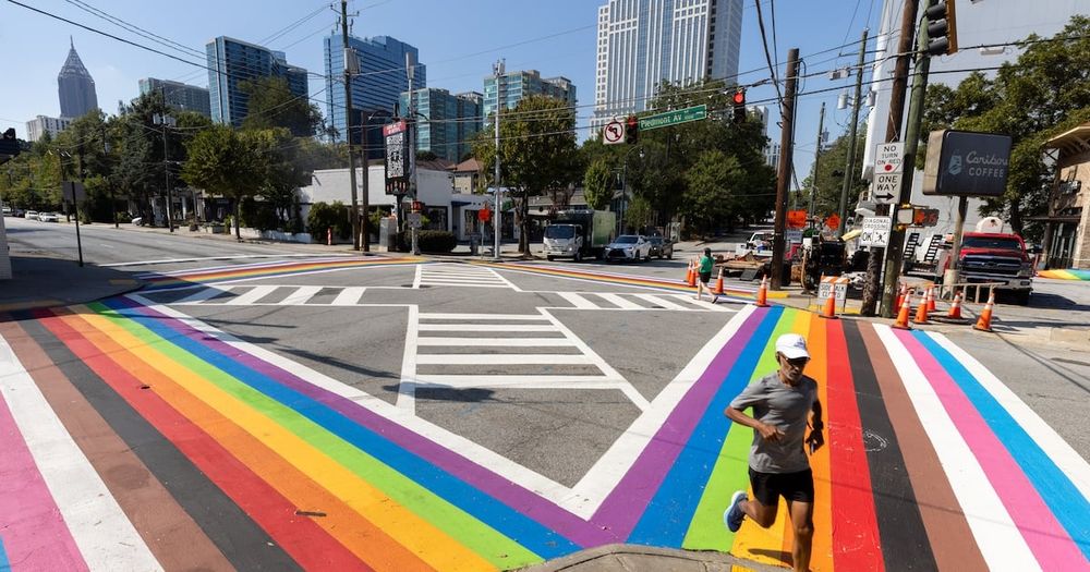 Atlanta’s rainbow crosswalks in Midtown are unlikely to lose their hue, even as crosswalks elsewhere are being stripped of their colors as part of a federal campaign.