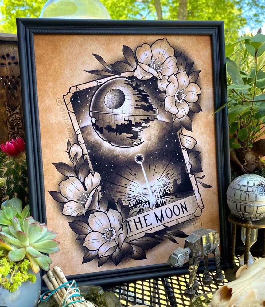 Picture of a Star Wars tarot card, The Moon, featuring the Death Star in place of the usual lifeless ball of rock. 
