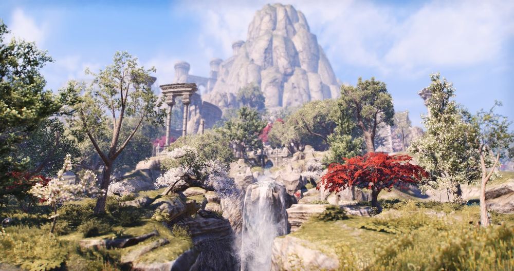 Fantasy landscape with a waterfall, colorful trees, and ancient ruins under a clear blue sky.