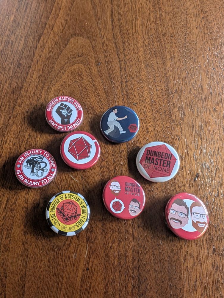 Several buttons that we have made for GenCon