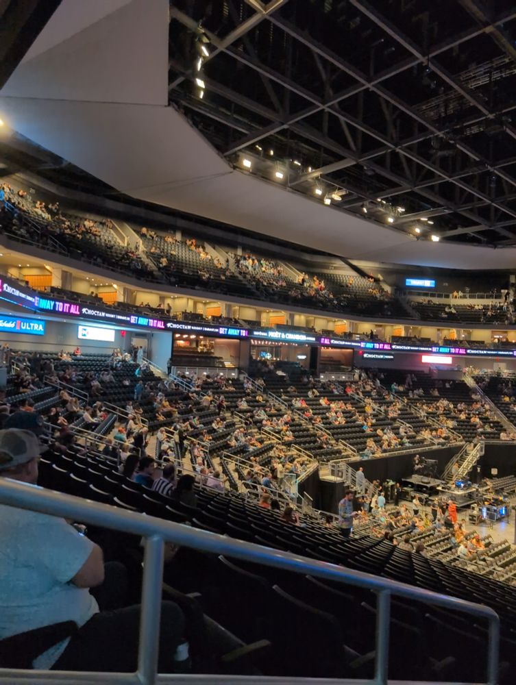 Pre-show shot of upper deck with people. 
