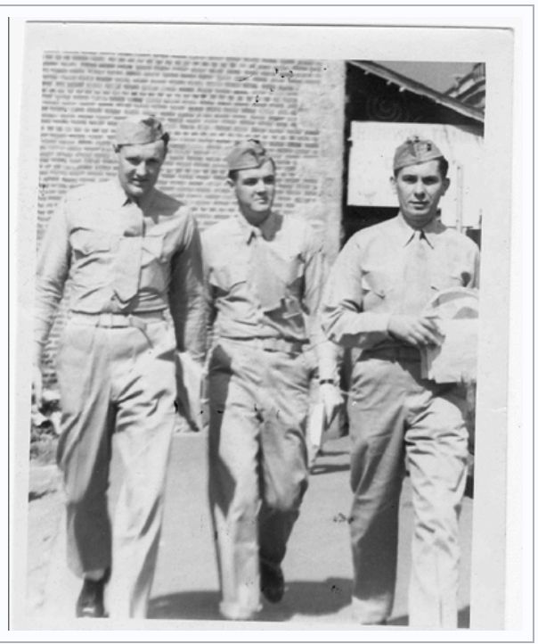 Black and white photo of three men in Marine uniforms, 1945 Honolulu.