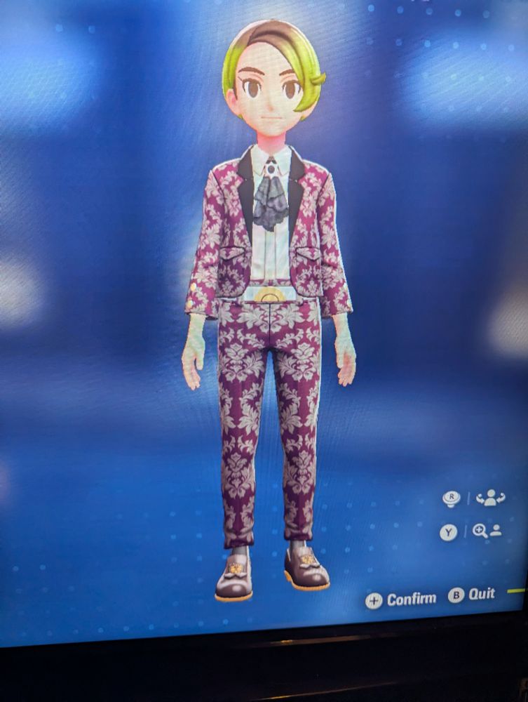 A burgundy paisley suit with dark gold accents, reminiscent of curtains. The character has a hair color of lime green and brown. 