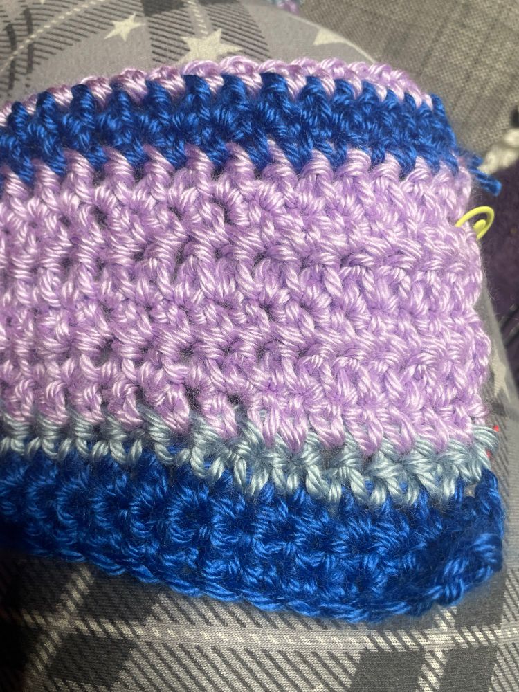 Single crochet blanket in royal blue, light blue and orchid Caron simply soft yarn.