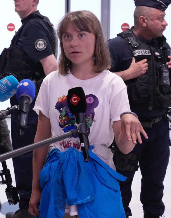 Greta Thunberg being interviewed by lots of media. 
