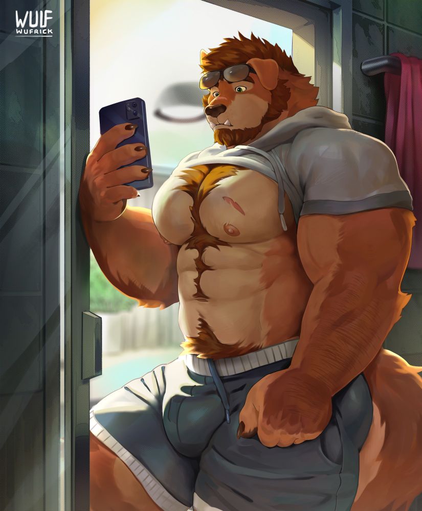 William lifts his shirt after putting away the groceries.
