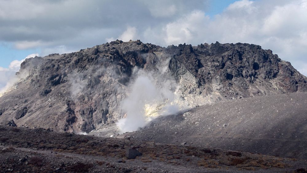 Lava dome topping Mount Tarumae, with sulfuric fumes.