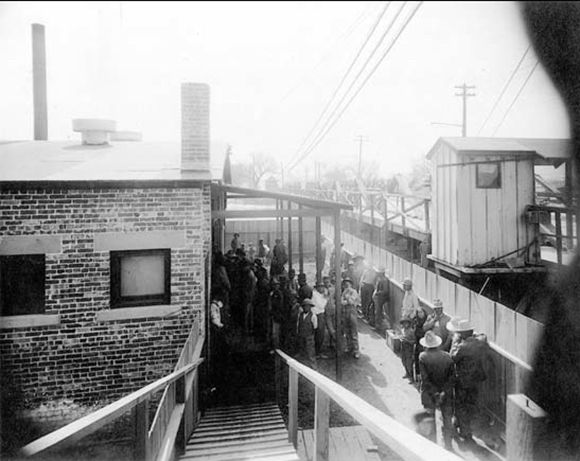 Mexicans awaiting de-lousing at the El Paso disinfection station, 1917