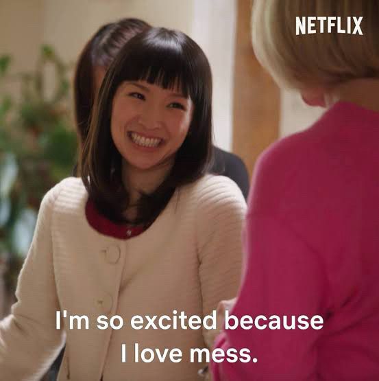 Screenshot of Marie Condo grinning with the text “I’m so excited because I love mess.”