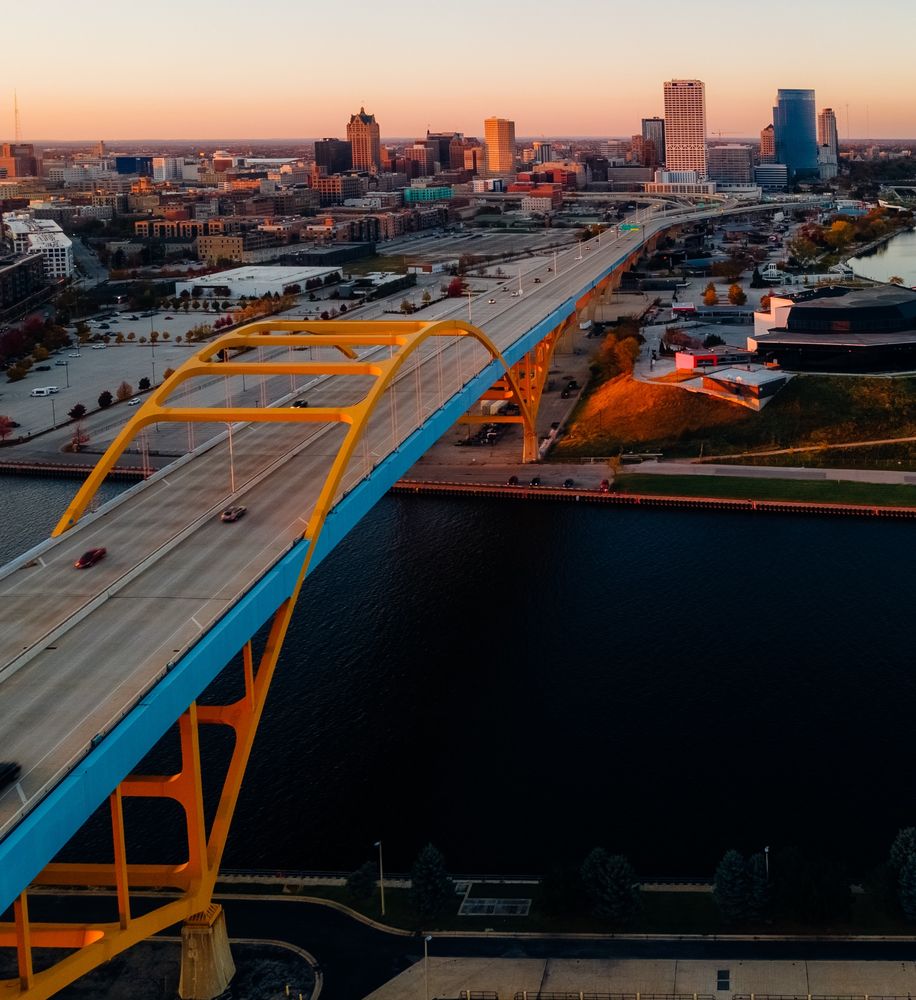 Photo of the Milwaukee skyline at sunset taken from south of downtown near the water treatment facility
