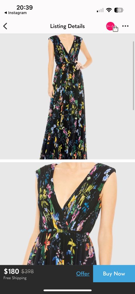 Pleated floral dress on a black background by Mac Dougall