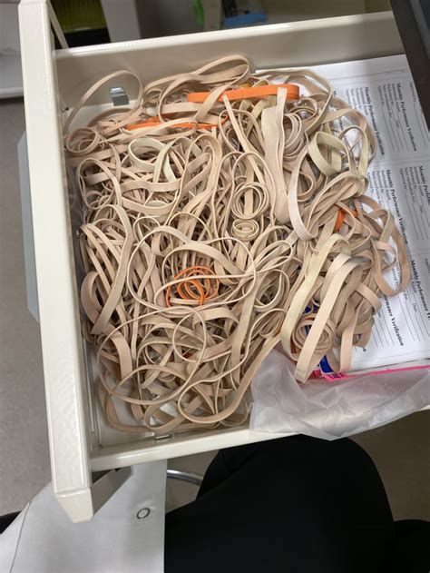 A drawer full of rubber bands