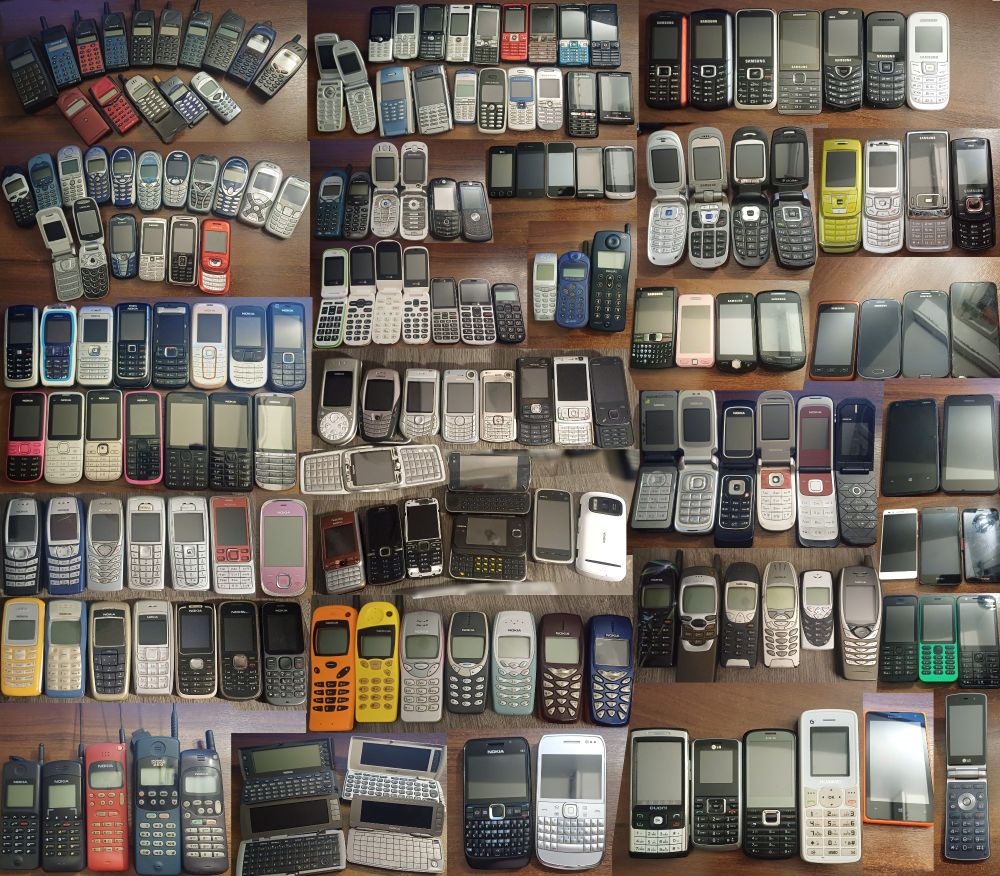 All of my phones, excluding duplicates.
- Top left panel: Ericsson
- Below that: Siemens
- Top center panel: Sony Ericsson
- Some of the top right-most panels: Samsung
- Most of the other panels are Nokia and miscellaneous brands (like Motorola and LG, which I don't have many of).
Notable ones include Nokia's Symbian smartphones (around the center) and the Communicators (bottom row, second panel from the left).