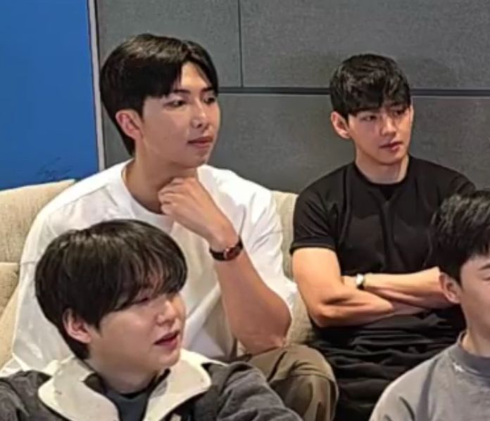 NJ sitting next to TH and looking huge.