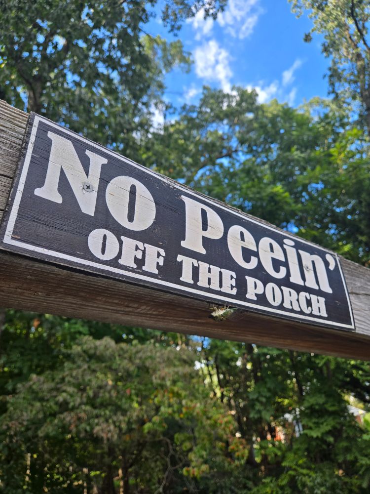 A sign on the deck reading 