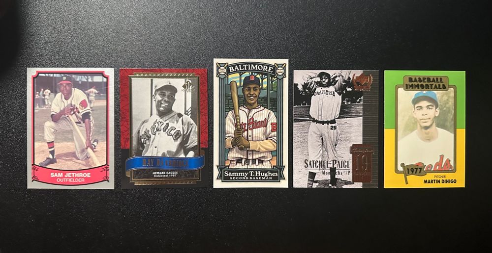 Baseball cards of Sam Jethroe, Ray Dandridge, Sammy T. Hughes, Satchel Paige, and Martín Dihigo