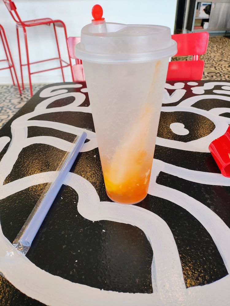 Mango boba cream chiller, sparkling boba drink with a creamsicle.