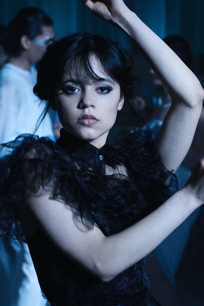 Jenna Ortega playing Wednesday Addams, dancing pose