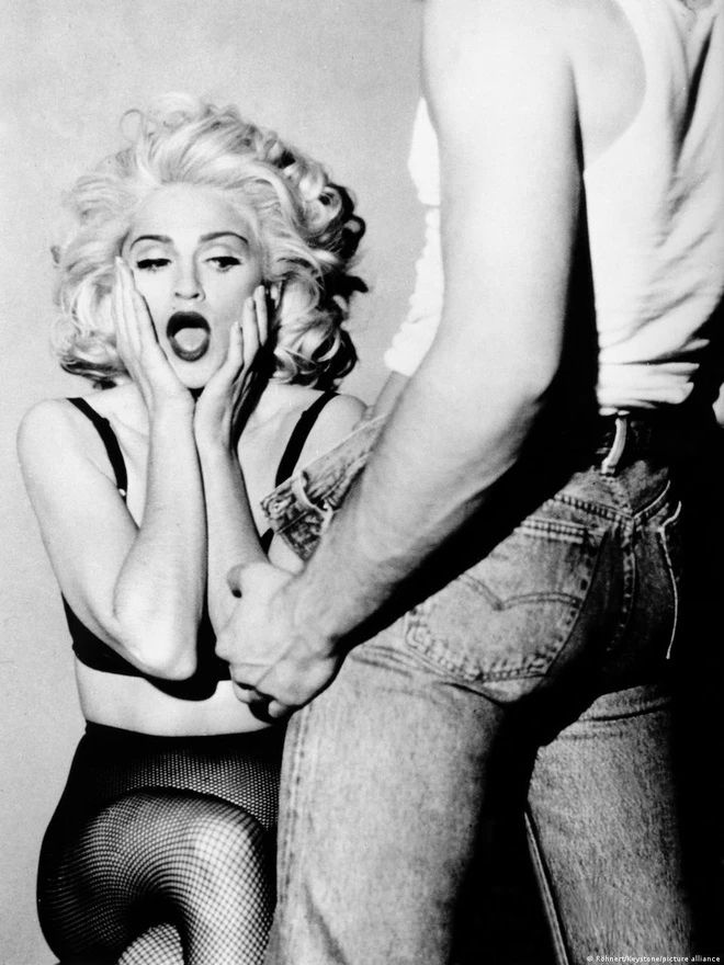 Madonna Advocate photoshoot 1991. Madonna surprised - man in jeans flashing her